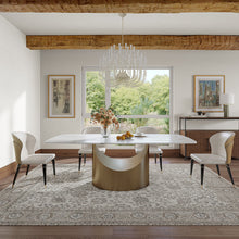 Charger l'image dans la galerie, Modern white marble dining table with a gold crescent-shaped base, paired with white upholstered chairs, perfect for elegant and sophisticated dining rooms