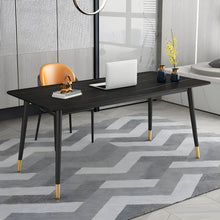 Charger l'image dans la galerie, What is the best modern desk for a stylish home office? This sleek black desk with gold-accented legs offers a minimalist workspace, paired with a contemporary orange chair. The clean design is complemented by decor accents and a geometric rug, creating a functional and modern home office setup.