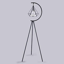 Charger l'image dans la galerie, Modern geometric floor lamp with black tripod stand and crescent design – A contemporary floor lamp featuring a black tripod stand and a geometric pendant light suspended within a crescent frame, perfect for modern interior decor.
