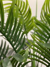 Load image into Gallery viewer, Close-up of vibrant green artificial palm leaves, showcasing their detailed texture and lush tropical aesthetic, perfect for enhancing indoor decor with a natural touch.