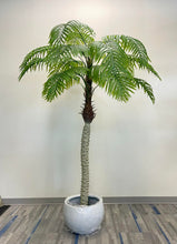 Load image into Gallery viewer,  Artificial palm tree in a stylish office adding a natural touch to a professional setting.