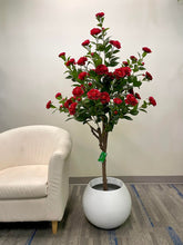 Charger l'image dans la galerie, Artificial red flowers in a modern white planter, ideal for adding a vibrant touch to indoor spaces such as living rooms or offices