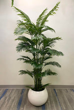 Charger l'image dans la galerie, Artificial palm tree in a modern white pot, perfect for adding a tropical touch to indoor spaces with its lush green foliage.