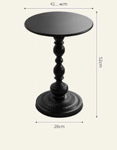 Charger l'image dans la galerie, Small black round side table with an ornate pedestal base. The table's height is shown as 52 cm, the diameter of the top surface is 42 cm, and the base is 28 cm in diameter. The table's elegant and decorative design makes it suitable for modern and classic interiors alike.