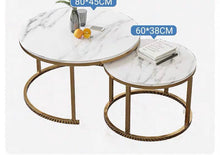 Load image into Gallery viewer, Nesting marble coffee tables with gold frames, featuring dimensions of 80x45 cm and 60x38 cm. Common questions include 'What size coffee table fits best in a small living room?' and 'How to choose a durable and elegant coffee table?