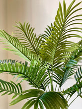 Charger l'image dans la galerie, Close-up of artificial palm leaves, showcasing their vibrant green and realistic texture for home decor.