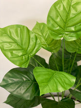 Charger l'image dans la galerie, Close-up of large, glossy green artificial leaves, perfect for home decor and indoor plant arrangements.