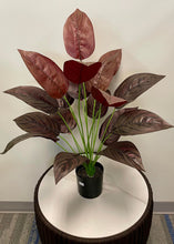 Load image into Gallery viewer, Elegant artificial dark red tropical plant with broad, textured leaves, perfect for adding a touch of sophistication to indoor spaces.