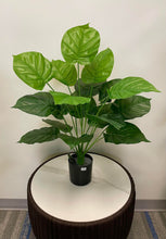 Charger l'image dans la galerie, Realistic artificial tropical plant in black pot, featuring large green leaves, ideal for modern home and office decoration.