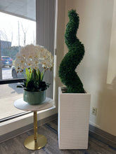 Charger l'image dans la galerie, Artificial spiral topiary in sleek white planter, paired with an elegant white orchid arrangement, perfect for modern interior décor.