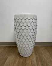 Charger l'image dans la galerie, A tall white planter with a textured scale pattern, placed on a wooden floor against a neutral wall. What are the best plants to pair with textured planters for a modern home look?