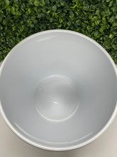 Charger l'image dans la galerie, Top-down view of a glossy white ceramic planter, showcasing its smooth interior. The background features green artificial foliage, enhancing the natural aesthetic.