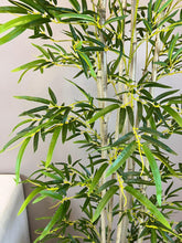 Load image into Gallery viewer, Close-up view of a realistic artificial bamboo plant with detailed green leaves and textured stems, ideal for indoor decor and adding a touch of natural beauty to any space