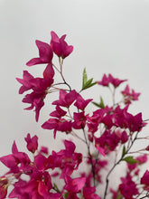 Load image into Gallery viewer, Close-up of vibrant pink artificial flowers with delicate green leaves against a soft, neutral background.