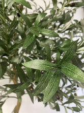 Load image into Gallery viewer, Close-up image of artificial olive tree leaves, highlighting the intricate vein patterns and realistic texture against a neutral backdrop.