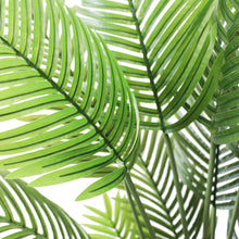 Charger l'image dans la galerie, Close-up of vibrant green artificial palm leaves, showcasing their detailed texture and lush tropical aesthetic, perfect for enhancing indoor decor with a natural touch.