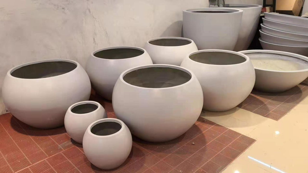 What materials are commonly used for pots and planters?