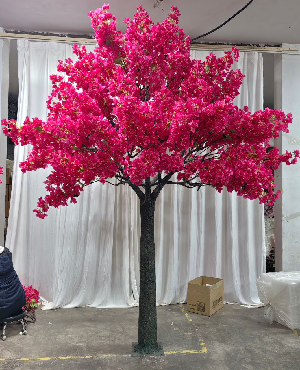 Creating Stunning Indoor Venues with Colorful Rental Faux Trees