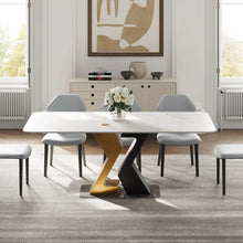 Charger l&#39;image dans la galerie, Contemporary white rectangular dining table with striking black and gold angular geometric base, complemented by sleek gray dining chairs
