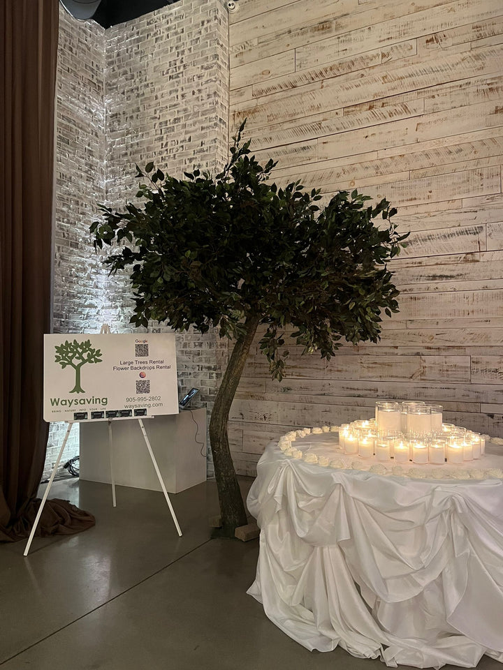 Large 10ft ficus artificial tree set at the corner of an event to add a modern look