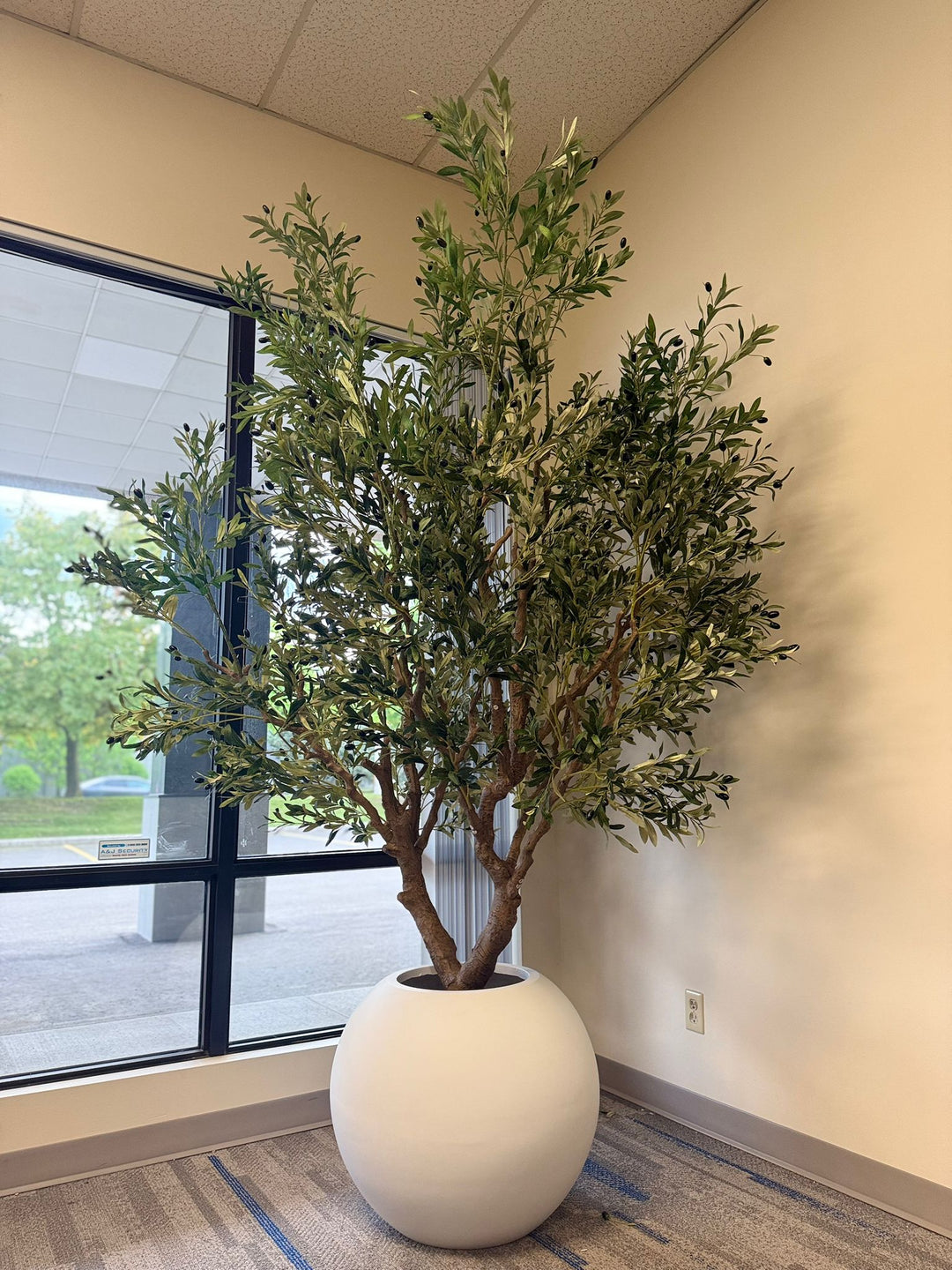Mediterranean style artificial olive tree for interior spaces