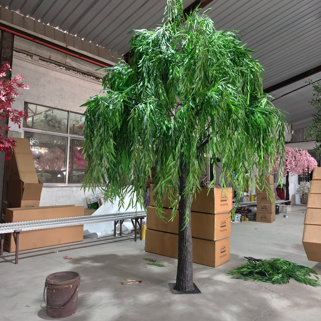 artificial willow trees decorating a wedding reception in GTA