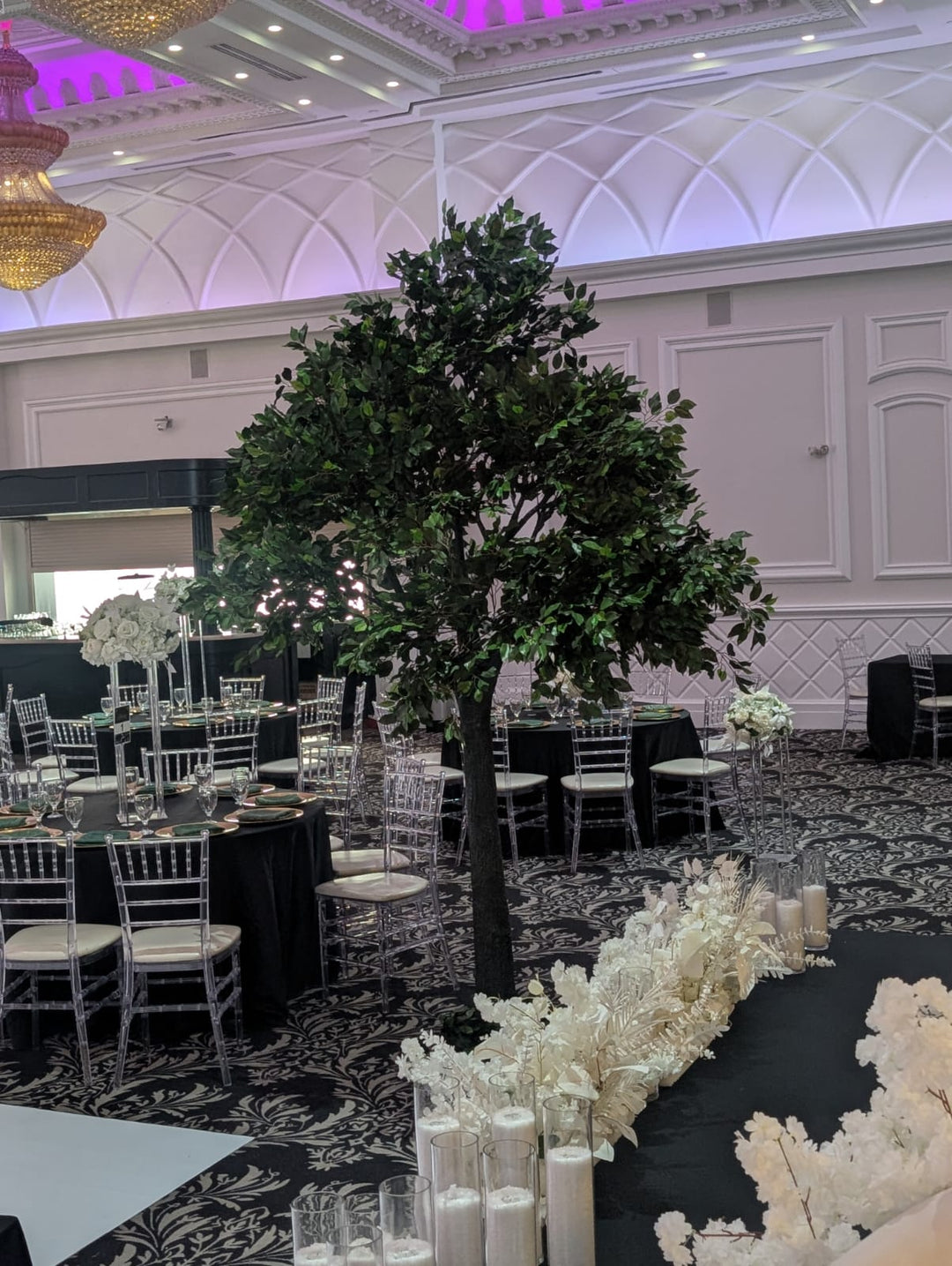 Artificial ficus tree adding the touch of greenery in a wedding event venue in Toronto