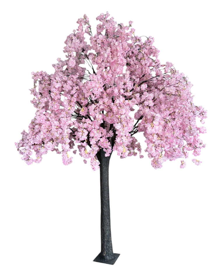 Pink artificial weeping cherry blossom tree on a white background