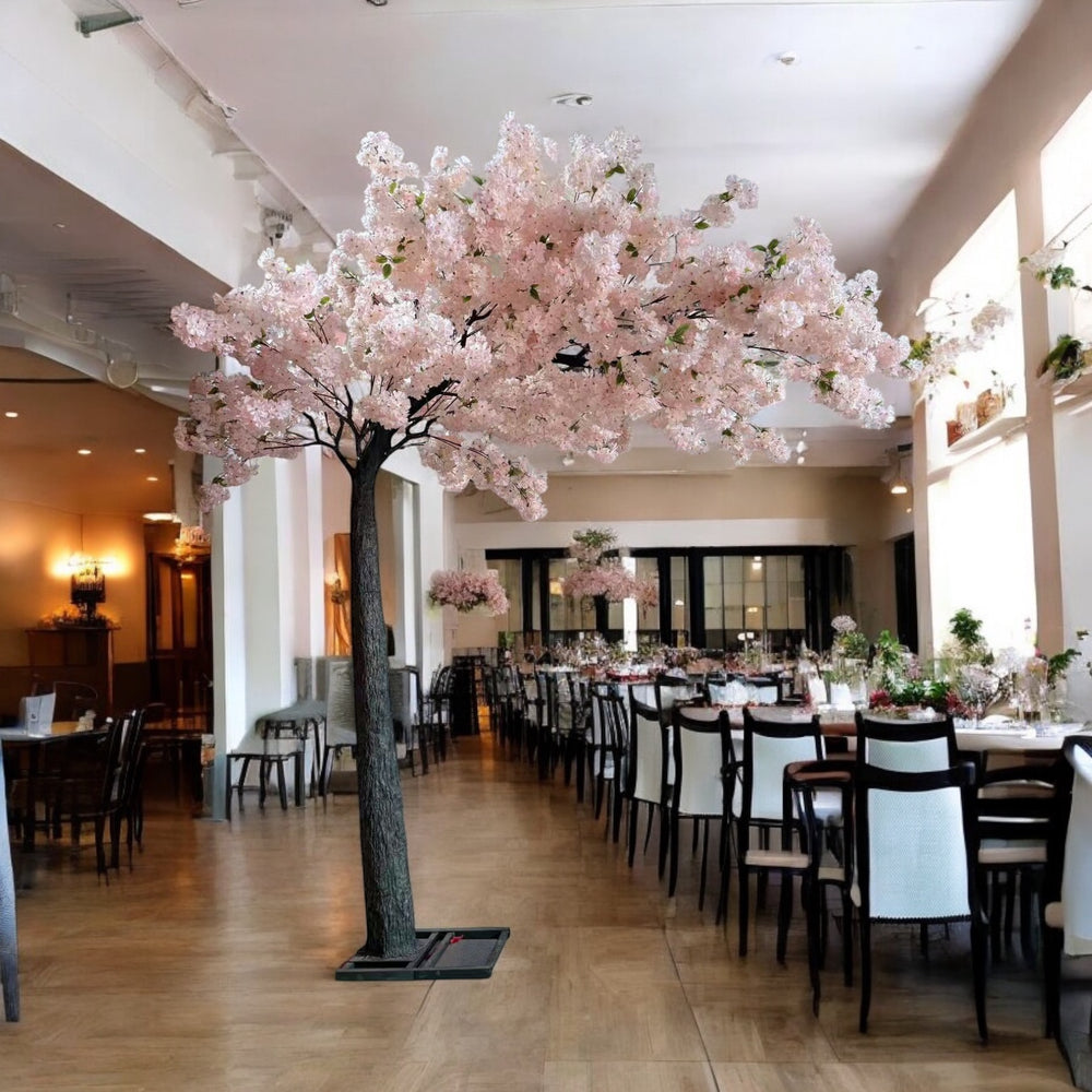 Artificial cherry blossom arch with white and light pink flowers for event décor