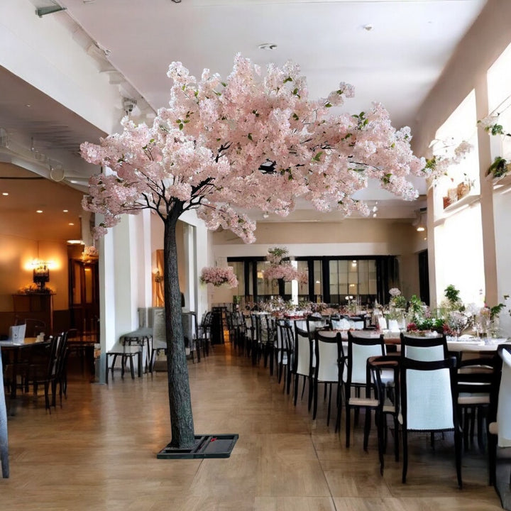 Artificial cherry blossom arch with white and light pink flowers for event décor