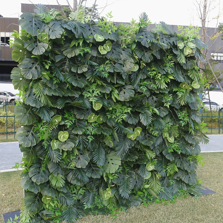 Artificial foliage backdrop with a mix of tropical leaves, creating a vibrant green wall for events, office decor, or home accents. How easy is it to install this artificial backdrop? Does it require any maintenance or special care?