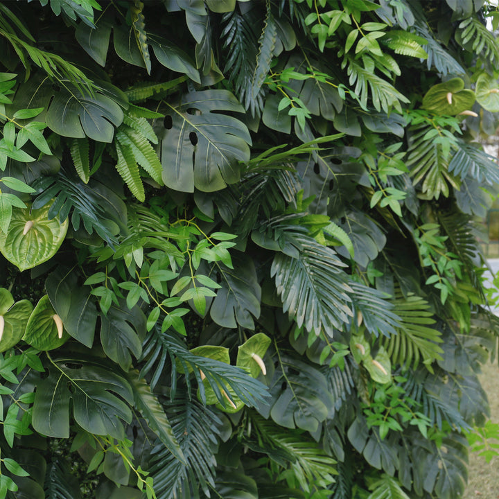 Close-up of an artificial green leaf backdrop featuring tropical leaves in various textures, ideal for creating a natural jungle look. Perfect for events, photoshoots, and home decor. Can this backdrop be customized in size? How realistic is the detailing of the leaves?