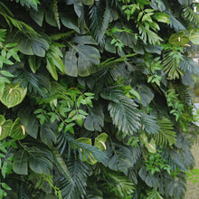 Charger l&#39;image dans la galerie, Close-up of an artificial green leaf backdrop featuring tropical leaves in various textures, ideal for creating a natural jungle look. Perfect for events, photoshoots, and home decor. Can this backdrop be customized in size? How realistic is the detailing of the leaves?
