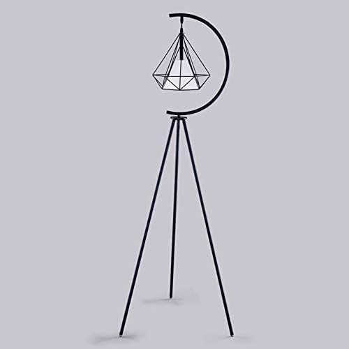 Modern geometric floor lamp with black tripod stand and crescent design – A contemporary floor lamp featuring a black tripod stand and a geometric pendant light suspended within a crescent frame, perfect for modern interior decor.