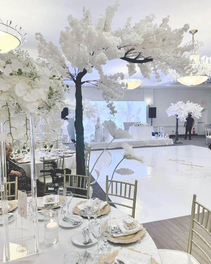 8ft arch white cherry blossom tree setup at an event venue, Toronto.
