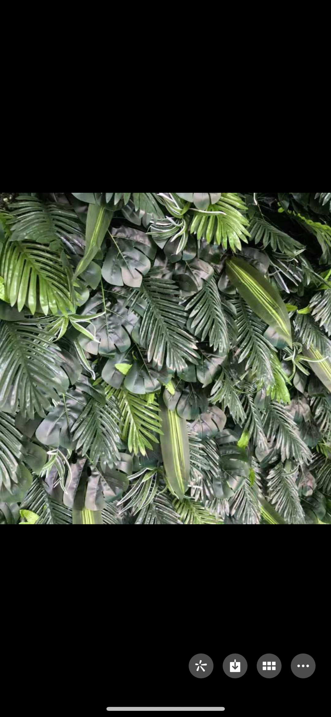 Lush green artificial foliage backdrop with a mix of tropical leaves. Ideal for weddings, parties, and corporate events as a photo backdrop or decorative wall. Is this backdrop easy to install and maintain? Does the greenery require any special care to retain its color and appearance over time?