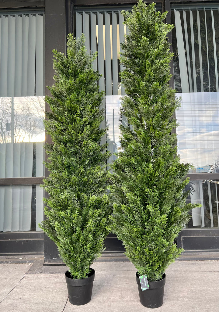 Pair of artificial evergreen trees in black planters, perfect for adding a touch of greenery to outdoor or indoor spaces with a realistic, low-maintenance option