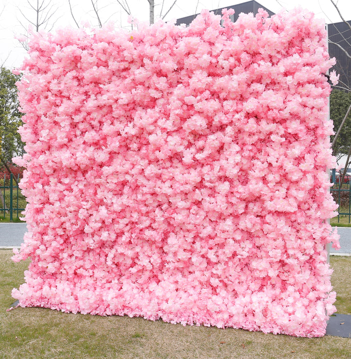Artificial pink flower wall backdrop, ideal for outdoor events or photoshoots. 
How do I set up an artificial flower wall backdrop? Can this flower wall be used indoors and outdoors? What are popular events for using a flower wall backdrop? How do I maintain an artificial flower backdrop?
