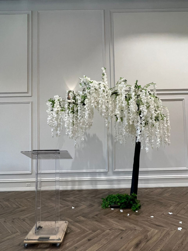 Large faux wisteria arch used as a decorative feature in a Toronto event reception.