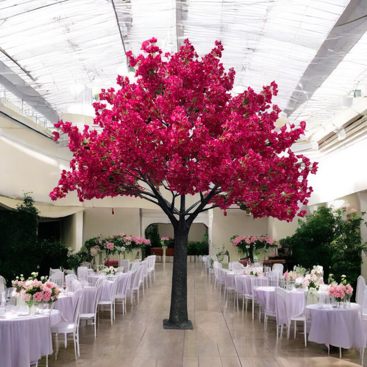 8ft artificial bougainvillea tree displayed in a Toronto event venue with bright pink flowers and lush greenery.