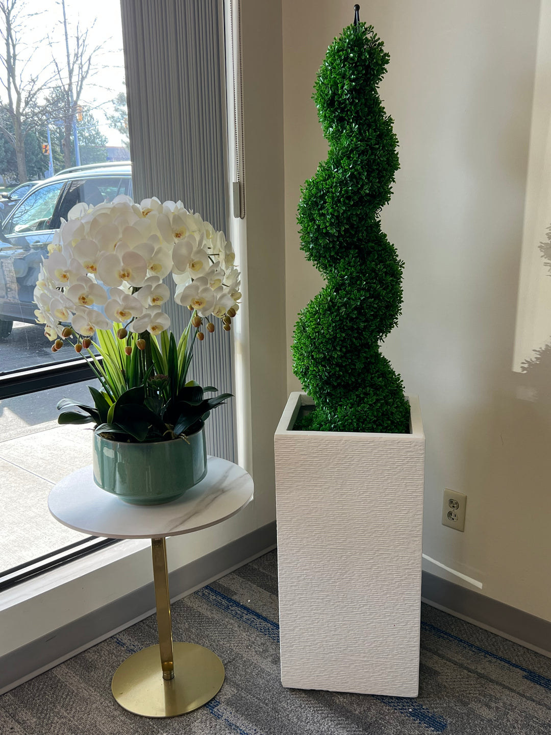 Artificial spiral topiary in sleek white planter, paired with an elegant white orchid arrangement, perfect for modern interior décor