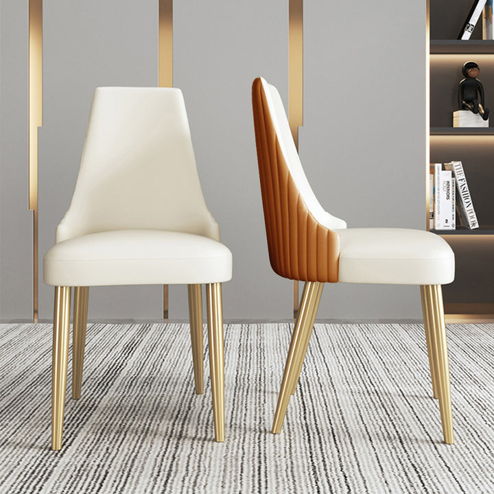 Modern dining chairs with white upholstered seats and gold metal legs, featuring a sleek brown accent back design. Popular questions include 'What are the benefits of PU leather chairs for dining rooms?' and 'How to choose the best chairs for comfort and durability?