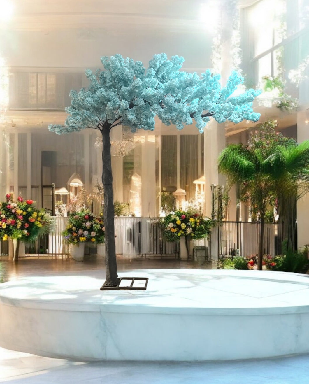 10ft artificial cherry blossom rental tree in a delicate light blue hue, ideal for creating a serene and elegant atmosphere at events, weddings, or interior spaces. Features lifelike blossoms and a durable design, perfect for adding a soft, calming touch to any venue.