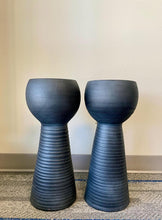 Load image into Gallery viewer, Sleek, black, textured planters with rounded bowls at the top and tapered, ribbed bases. The modern design of the planters gives them a stylish, minimalist appearance, perfect for contemporary indoor or outdoor settings.
