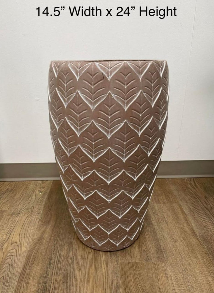 A decorative pot measuring 14.5 inches in width and 24 inches in height, featuring a leaf-patterned design in terracotta. How to choose the right size of decorative pots for indoor plants?