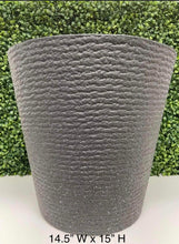 Load image into Gallery viewer, Large textured gray planter measuring 14.5 inches wide by 15 inches high, displayed against a green leafy background. The planter has a subtle, speckled design with a matte finish.
