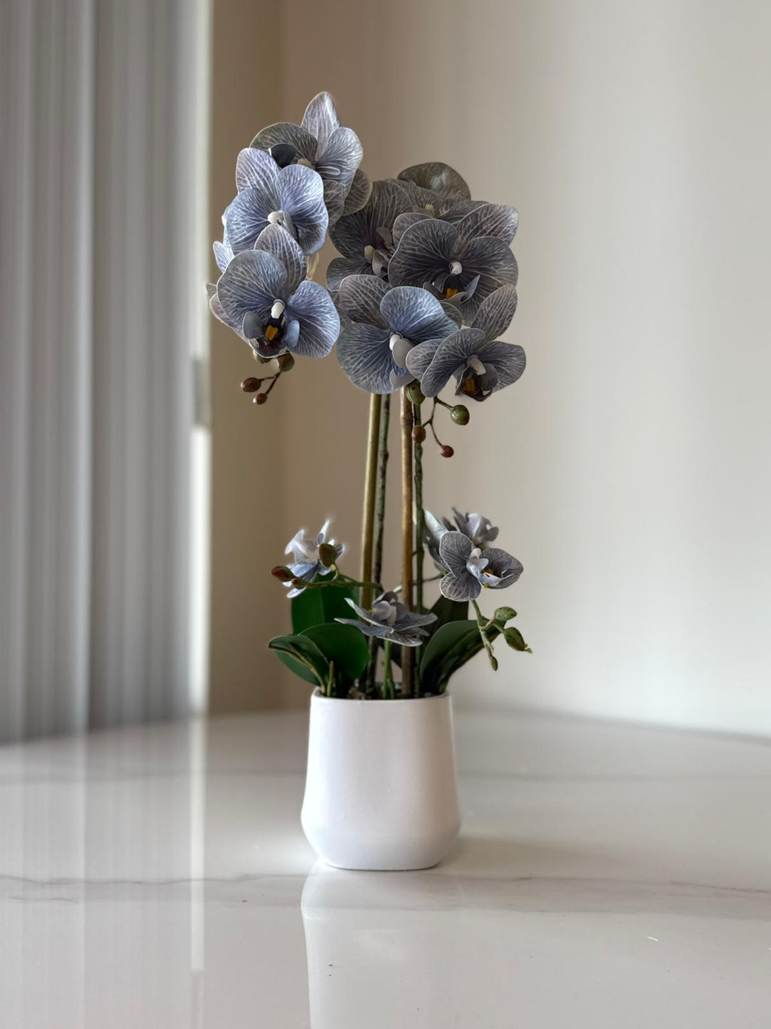 Lavender Orchid Arrangement with real tough flowers