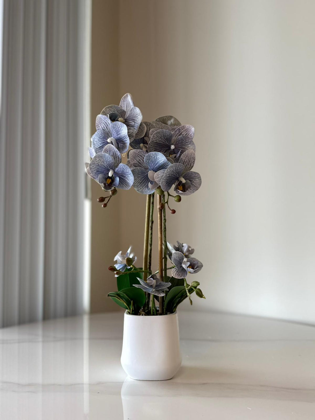 Lavender Orchid Arrangement with real tough flowers