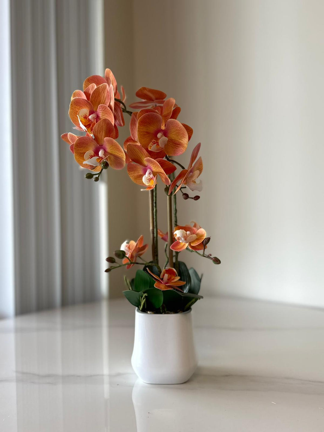 Orange Orchid Arrangement with real tough flowers