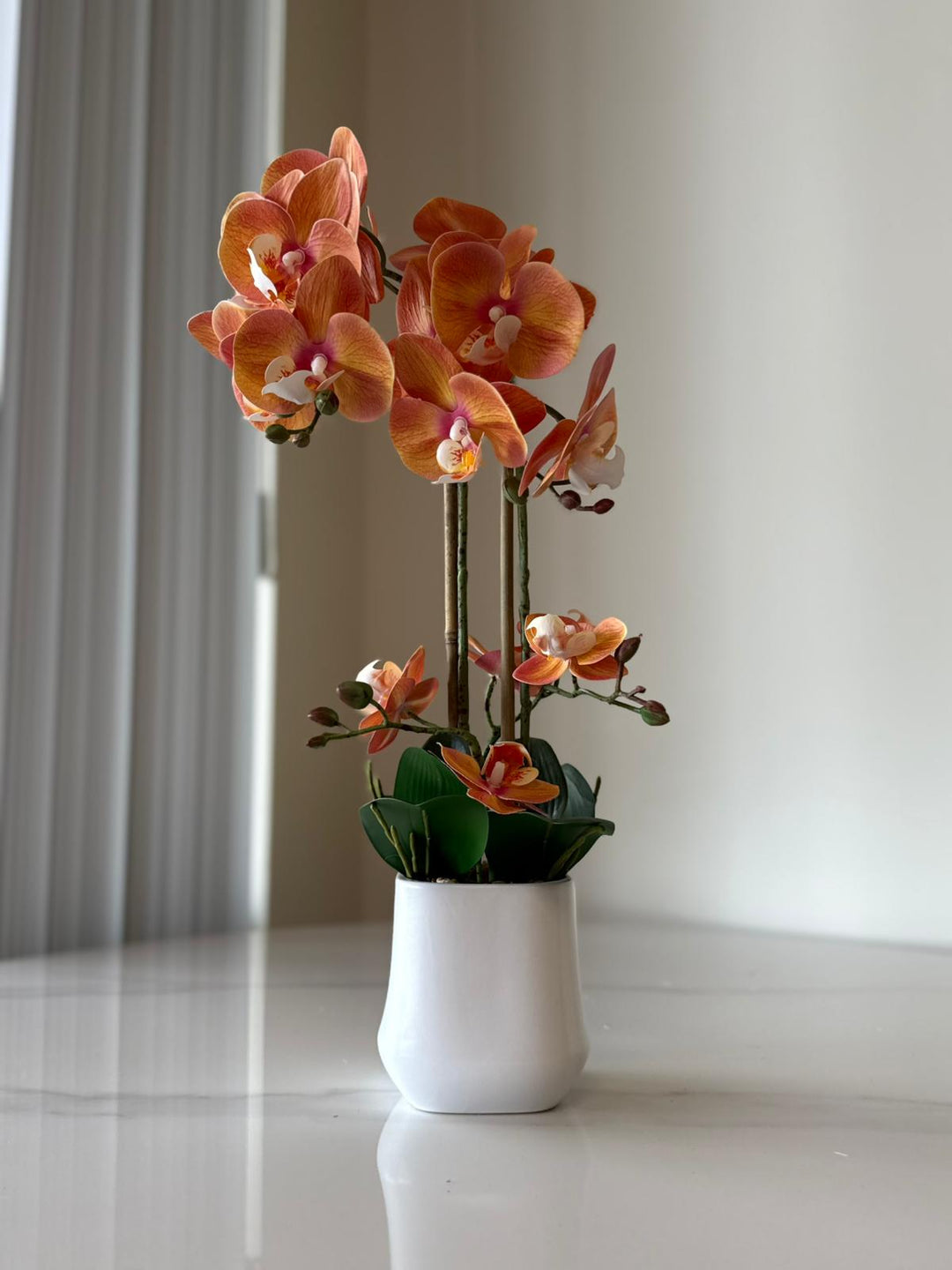 Orange Orchid Arrangement with real tough flowers